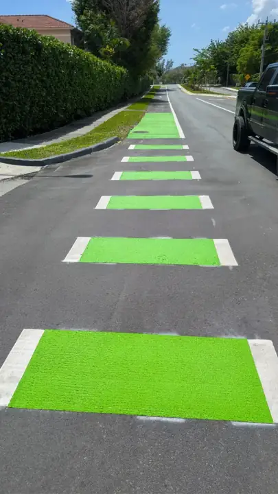 New crosswalk markings on a resurfaced street