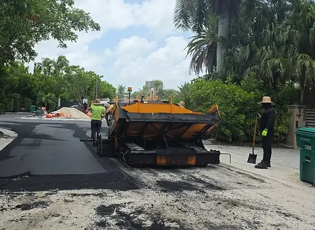 Belle Meade Island Roundabout: Paver working the approach