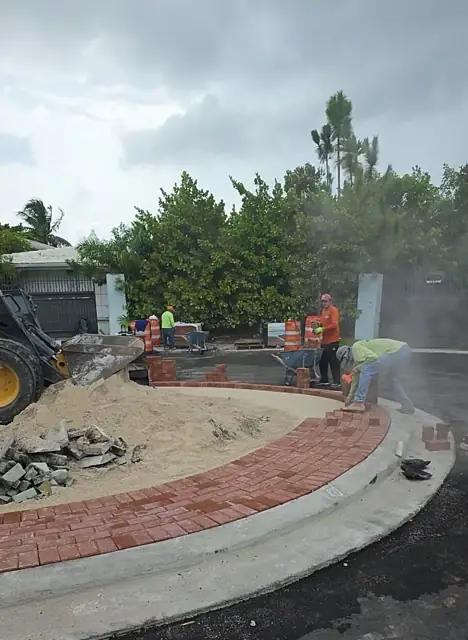 Belle Meade Island Roundabout: Compacting the paver base at the island