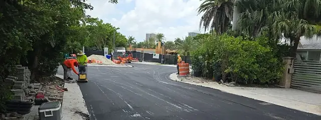 Belle Meade Island Roundabout: Fresh asphalt on the approach
