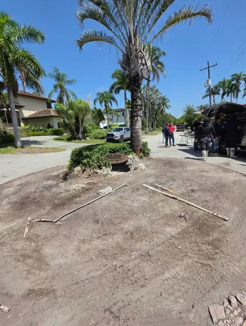 Cul-de-sac island cleared around the manhole