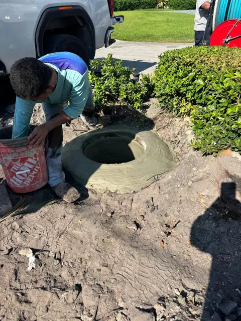 New mortar collar built at the top of the structure