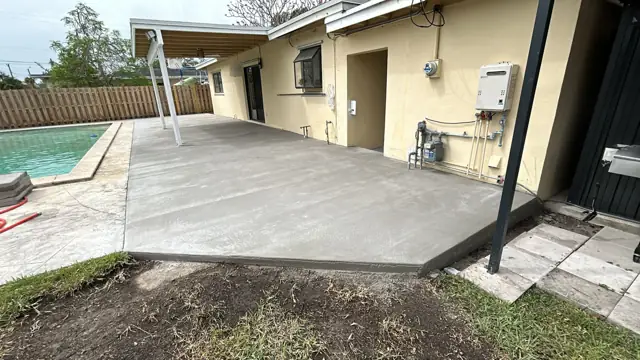 New concrete patio and pool deck