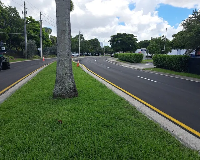 NW 30th Terrace Milling & Resurfacing: Both directions of NW 30th Terrace after resurfacing, divided by the landscaped median