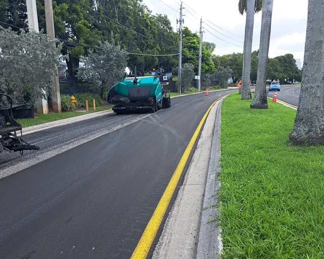 NW 30th Terrace Milling & Resurfacing: Paver placing the surface course on the milled lanes