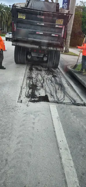 Asphalt Patching, Hollywood Beach: Milled area with tack coat, ready for asphalt