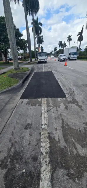 Asphalt Patching, Hollywood Beach: After: finished patch along the bike lane