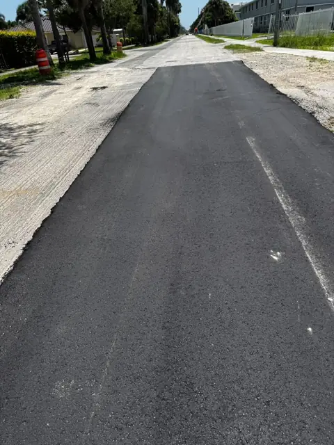 Milling & Resurfacing, City of Homestead: During: new mat placed next to the milled surface