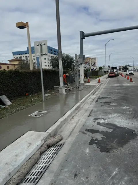 City of Miami Sidewalk Improvements: Fresh concrete curing along the corridor