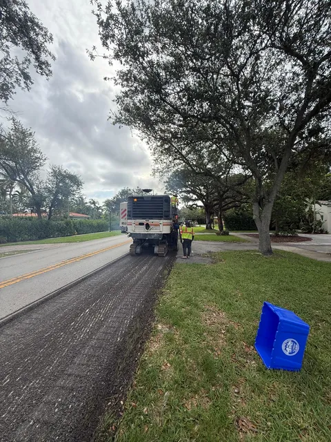 NE 103rd Street — FDOT: Milling machine removing the existing asphalt surface