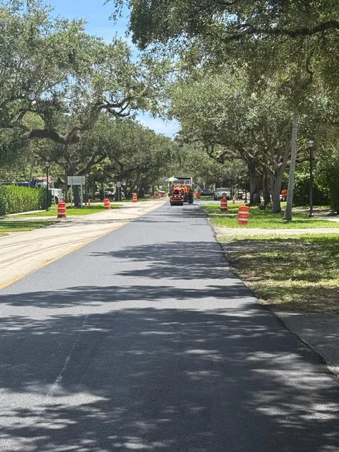 NE 103rd Street — FDOT: Roller following the paver on the new lane