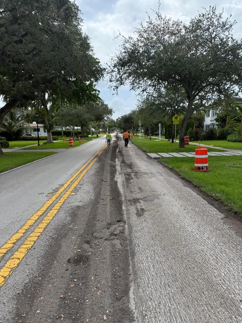 NE 103rd Street — FDOT: Milled surface ready for cleanup, with the travel lane kept open