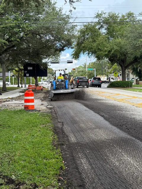NE 103rd Street — FDOT: Sweeping the milled surface before tack and paving