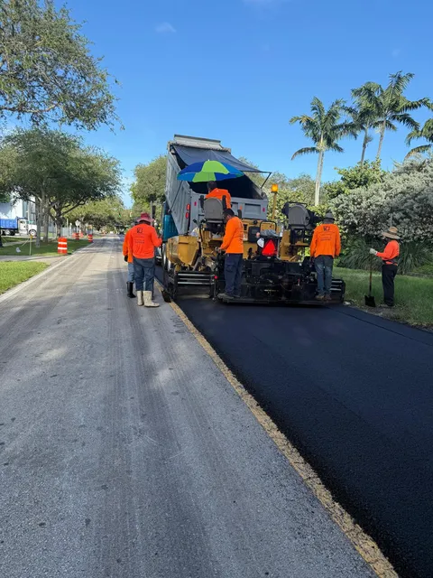 NE 103rd Street — FDOT: Pimentel paving crew placing the new surface course