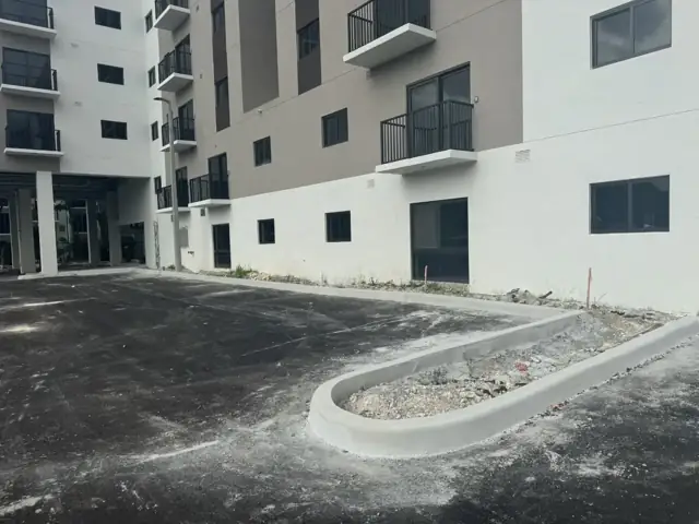 Stadium Towers: Concrete sidewalk poured