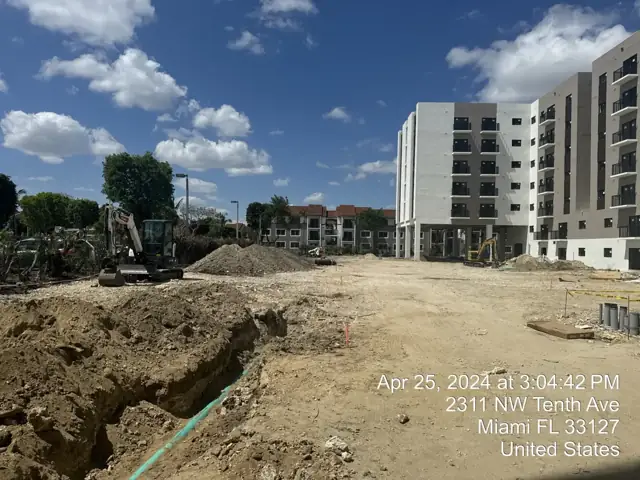 Stadium Towers: Asphalt paving the drive aisle