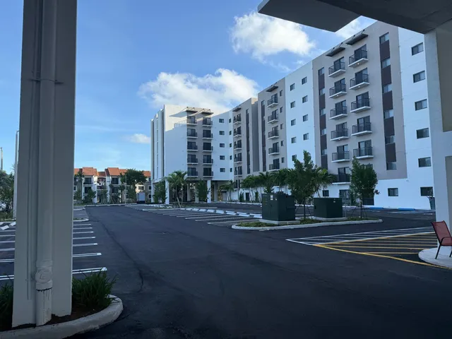 Finished commercial-grade parking lot with new striping at Stadium Towers in Miami