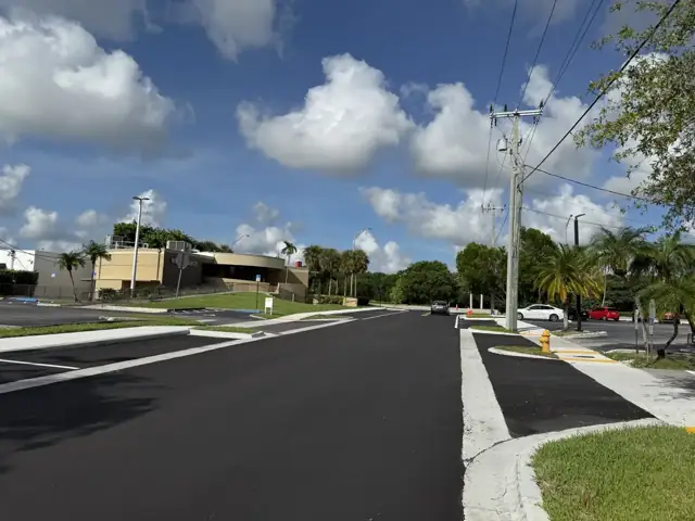 SW 148th Street Roadway Improvements: Concrete sidewalk poured and finished
