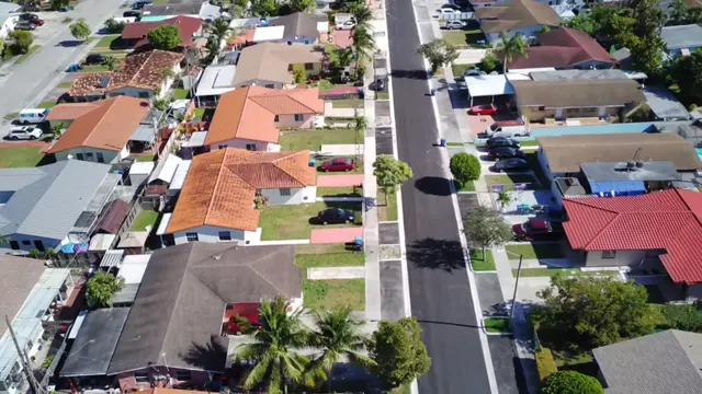 Sweetwater Neighborhood Roadway Improvements: Aerial of new sidewalk, curb, driveway aprons and asphalt on the western block