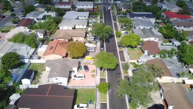 Sweetwater Neighborhood Roadway Improvements: Corridor aerial showing continuous concrete sidewalk and new street trees