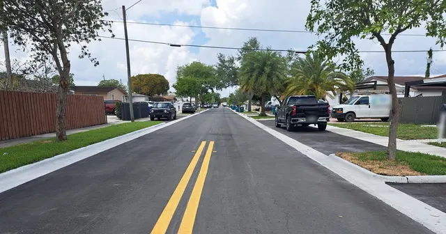 Sweetwater Neighborhood Roadway Improvements: Double yellow centerline on the new asphalt surface
