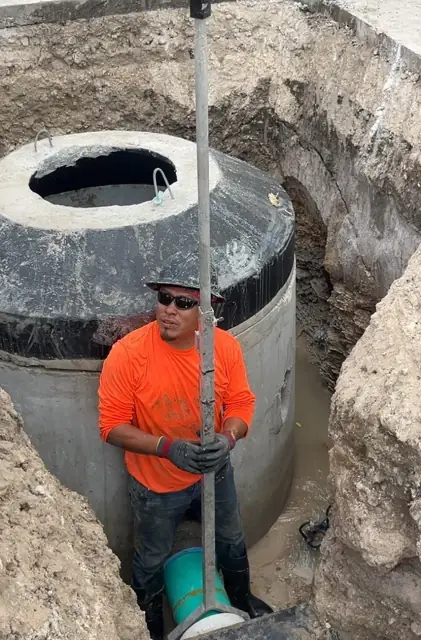 West Little River Sewer & Resurfacing: Finishing the invert inside the manhole