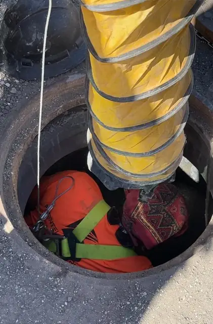 West Little River Sewer & Resurfacing: Confined-space ventilation for manhole work